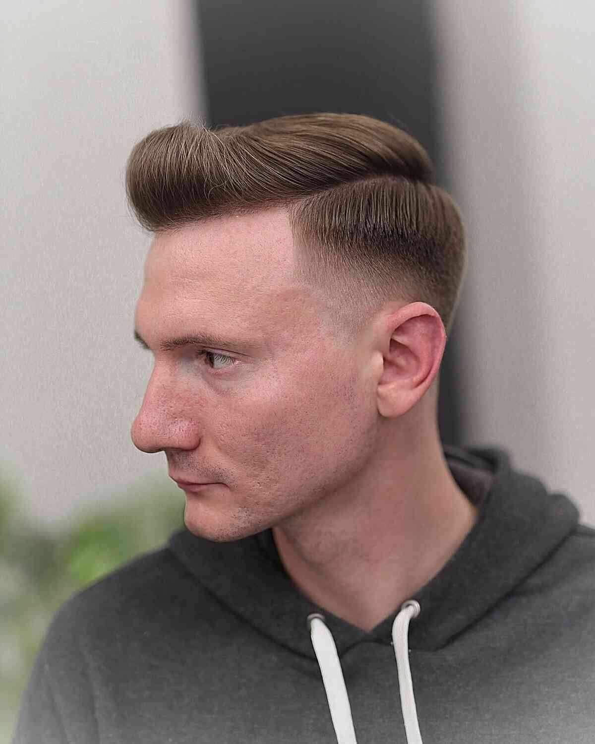 A volumized quiff hairstyle optimized for fine or thinning hair.
