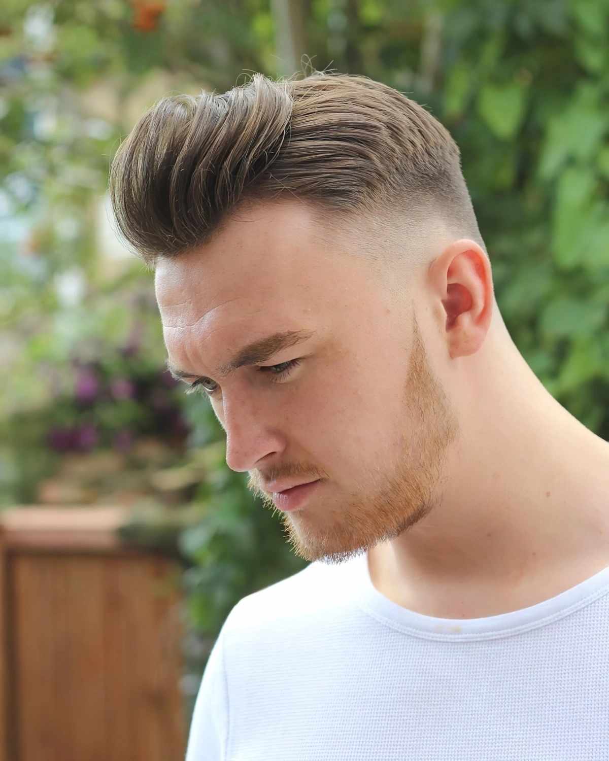 A neat, conservative formal quiff hairstyle for business events.