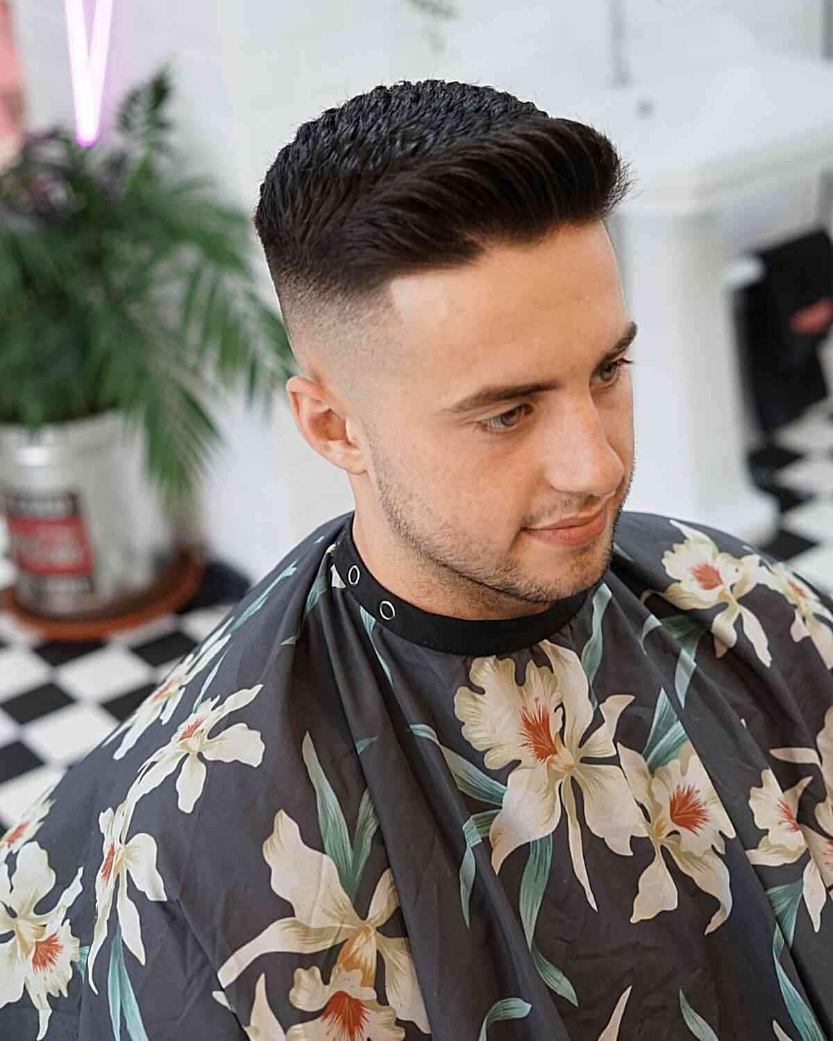 A low-maintenance short quiff haircut for a professional office look.