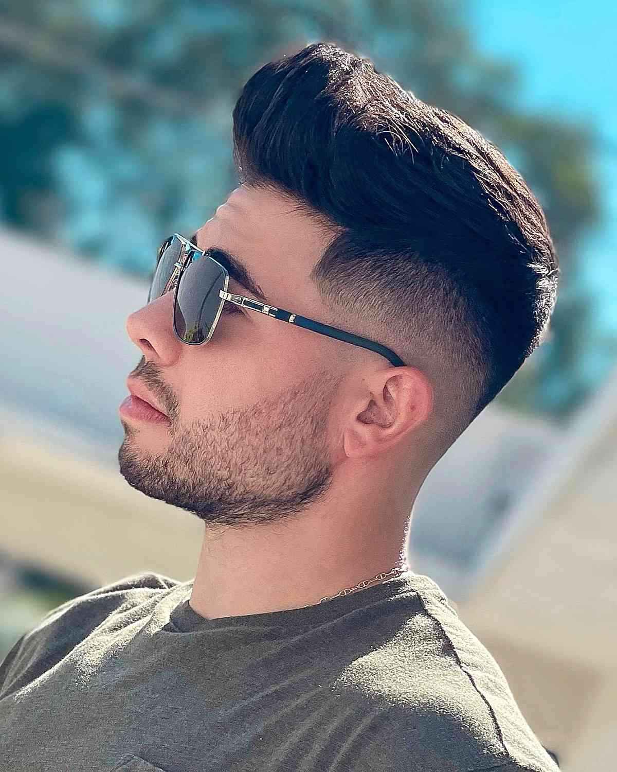 A medium-length quiff style providing versatile everyday volume.