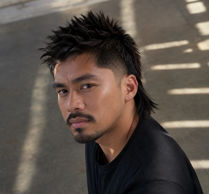 spiky mullet hairstyle textured men